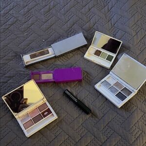 Clinique used eyeshadow in greens one purple eyeshadow light pink